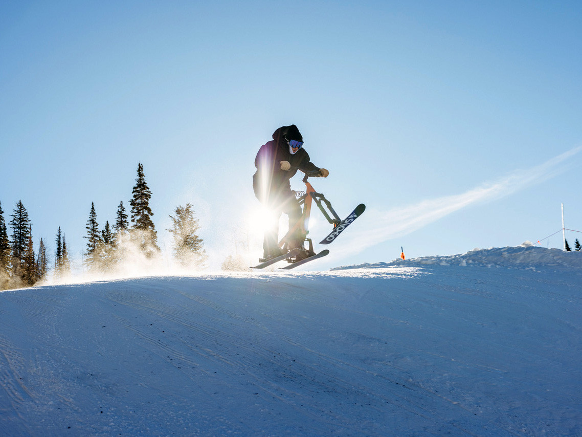 Riding Sno-Go ski bikes at Winter Park