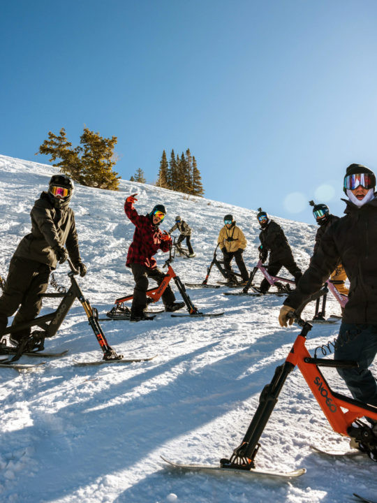 Riding Sno-Go ski bikes at Winter Park