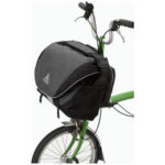 A bike messenger bag securely attached to a Brompton folding bike frame, demonstrating a practical solution for urban cyclists.