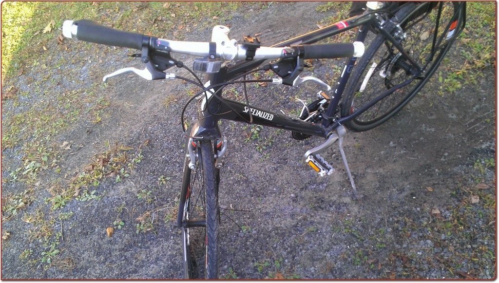 Cyclist preparing to adjust bike brakes