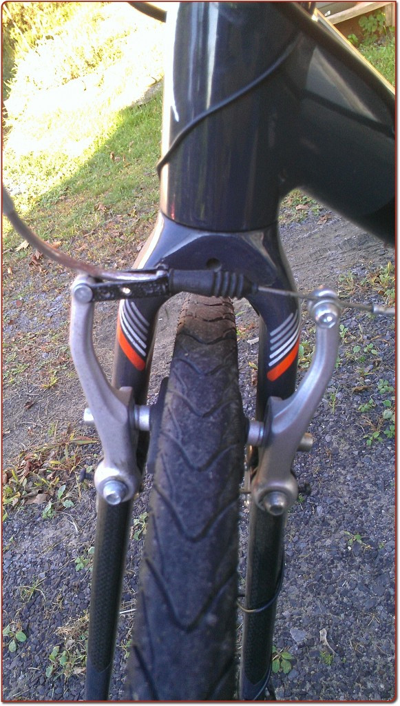 Front bike brake assembly after adjustment, ready for final checks