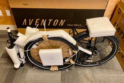 Electric commuter bike partially assembled out of the box