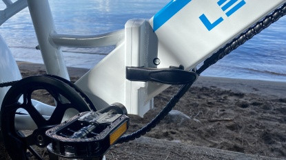 Frame closure mechanism of a folding eBike for structural integrity
