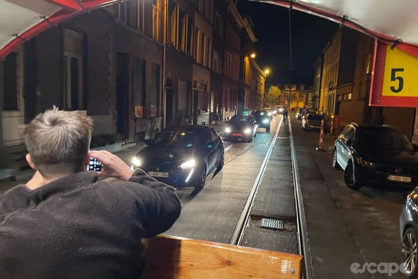 A long line of cars stuck behind the slow-moving beer bike in Ghent.