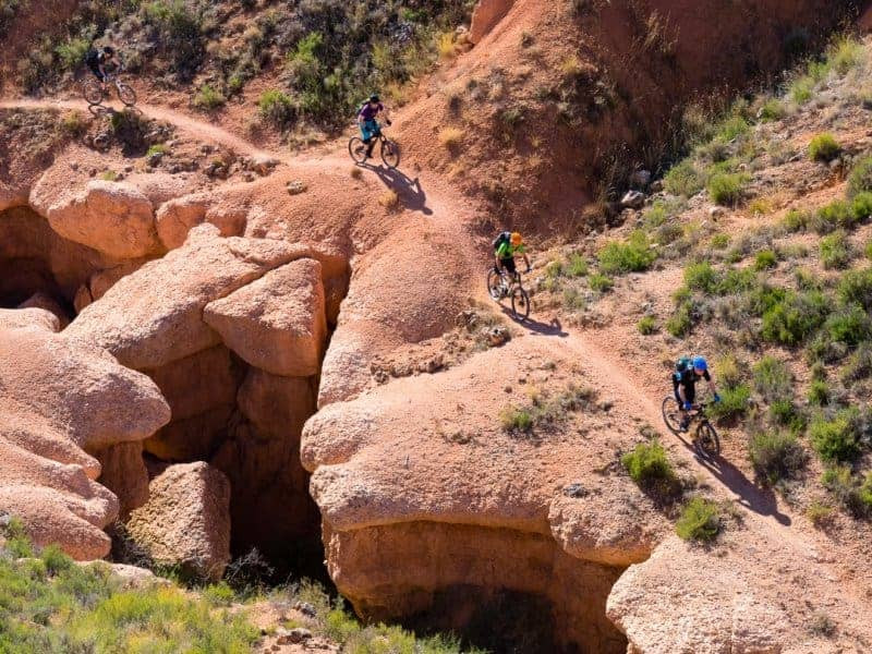 Mountain biker enjoying flowy bike Spanish trails in backcountry Pyrenees