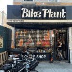The storefront of Bike Plant in Bed-Stuy, Brooklyn, showcasing its welcoming community bike repair shop.
