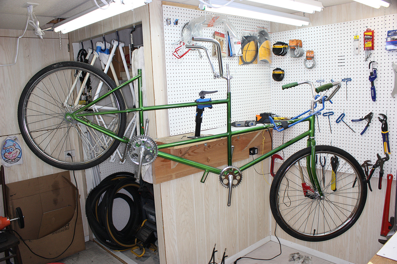 Schwinn Twinn Tandem nearing completion, showing the assembled frame, wheels, and components.