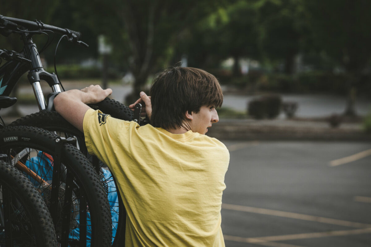 Boys focusing on balance during mountain bike drills