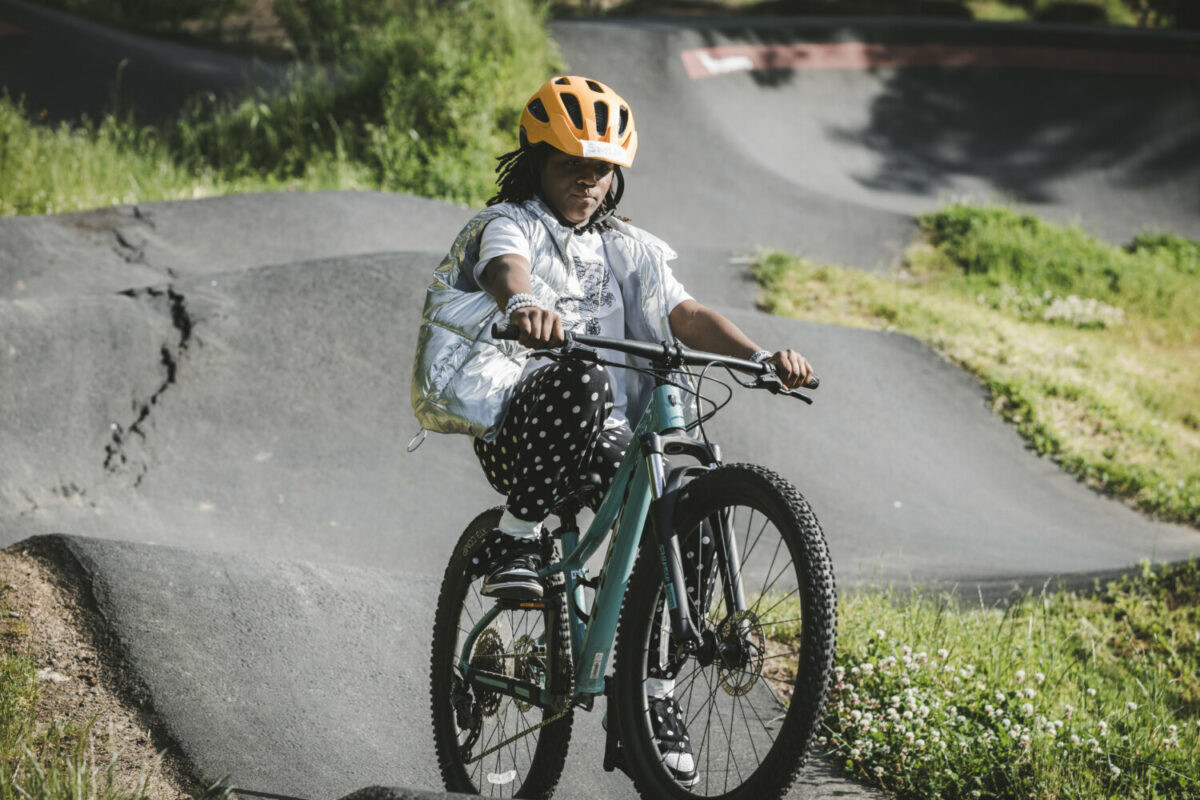 Boys celebrating after a mountain bike ride