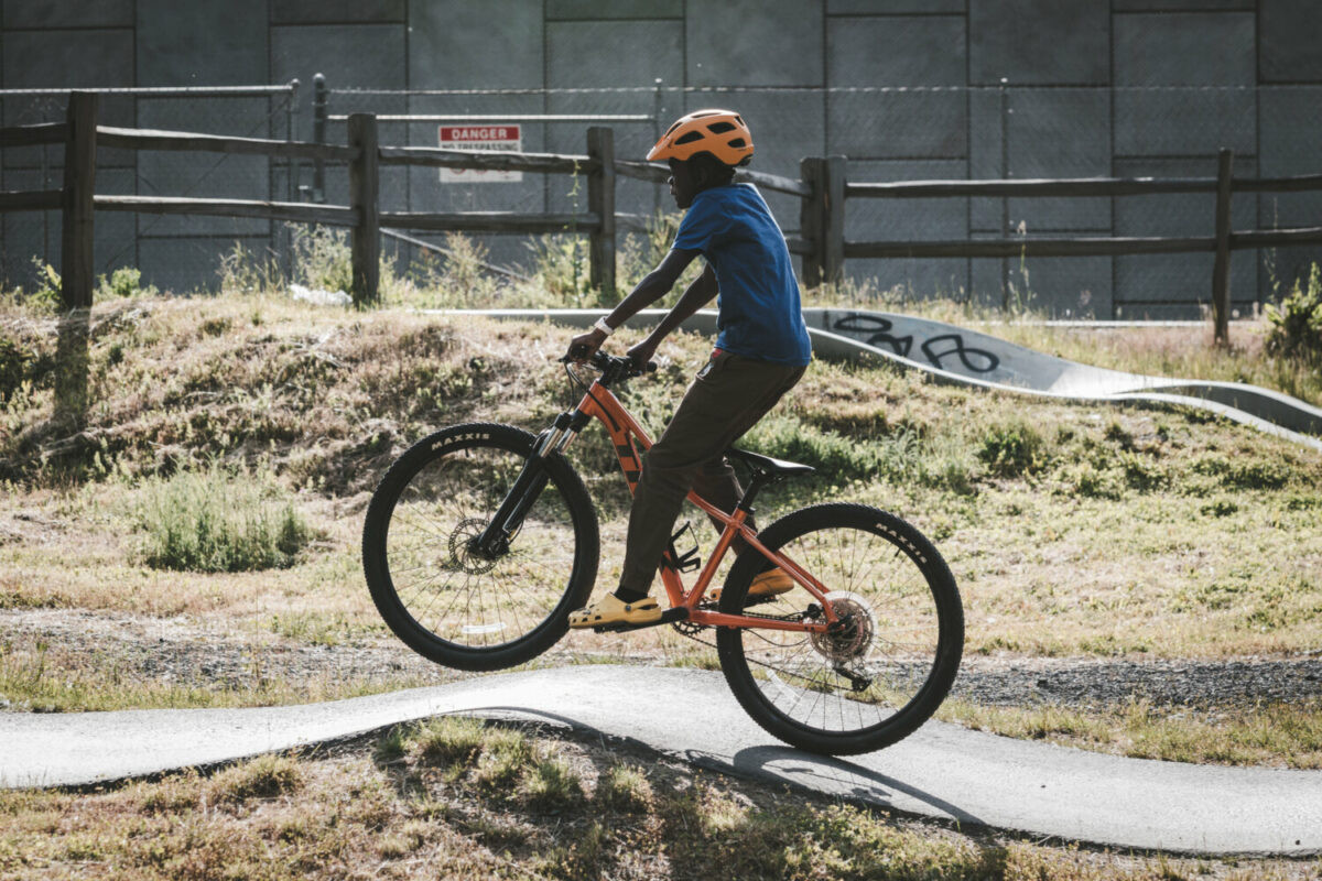 Boys mountain biking smiles