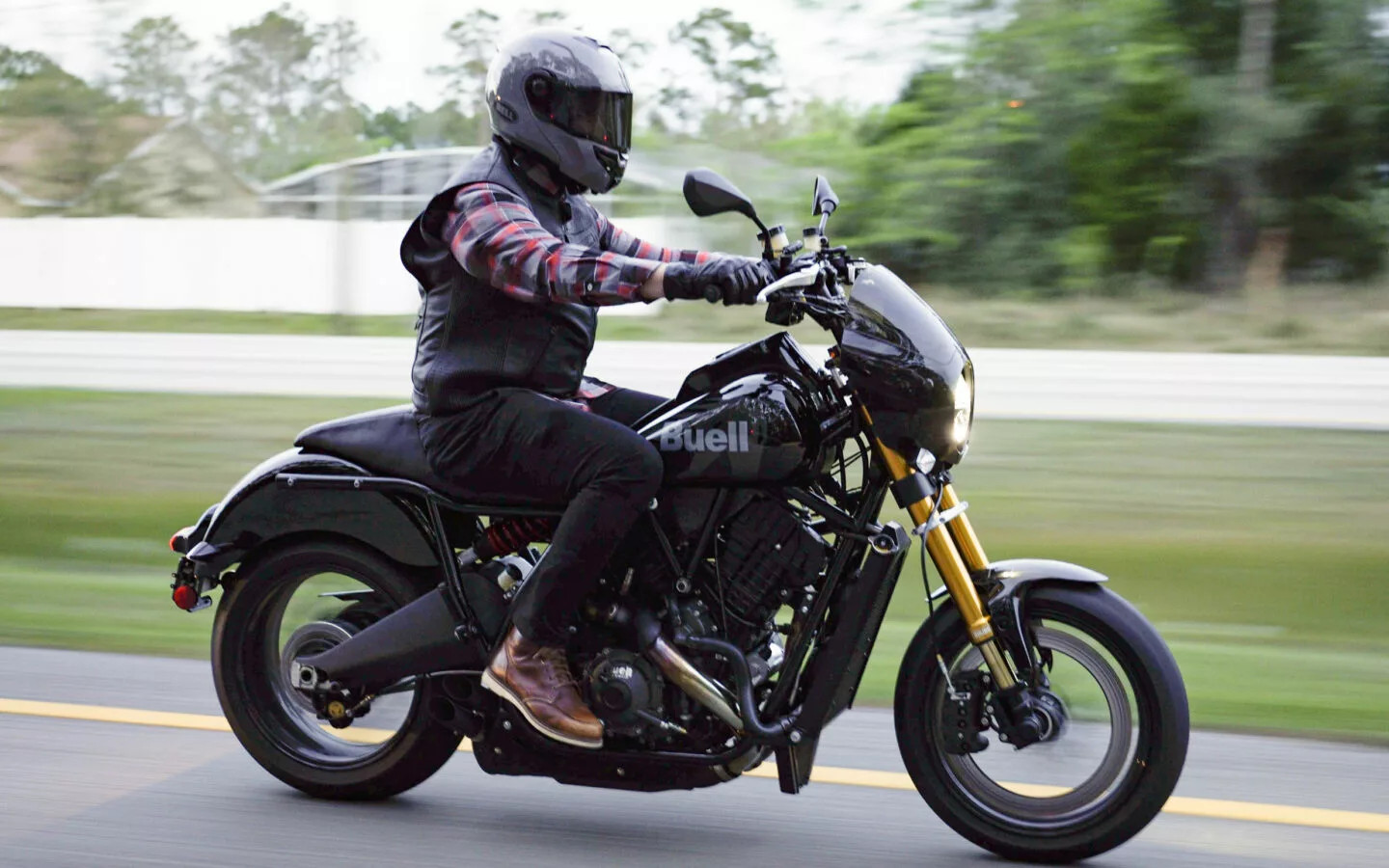 Rider on the Buell Super Cruiser prototype during Daytona Bike Week showcasing the bike's aggressive stance and powerful engine