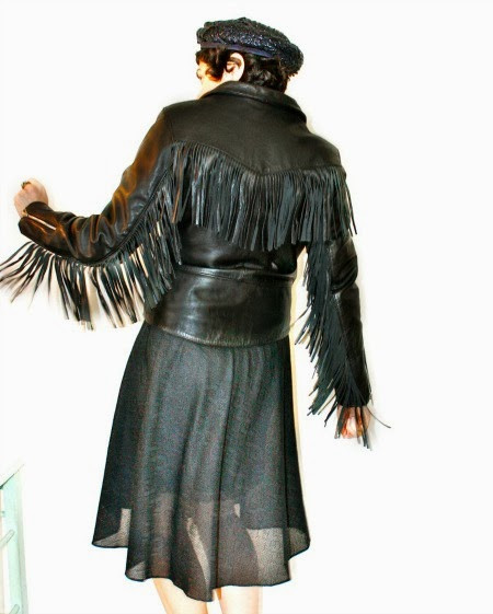 Front and back view of a vintage fringe biker jacket ideal for creating stylish biker babe outfits