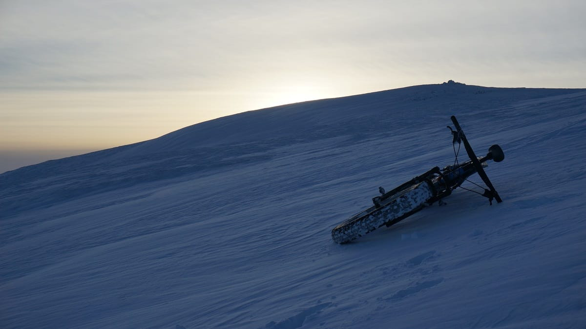 RockShox Bluto testing in snowy mountains, showcasing its performance in winter conditions