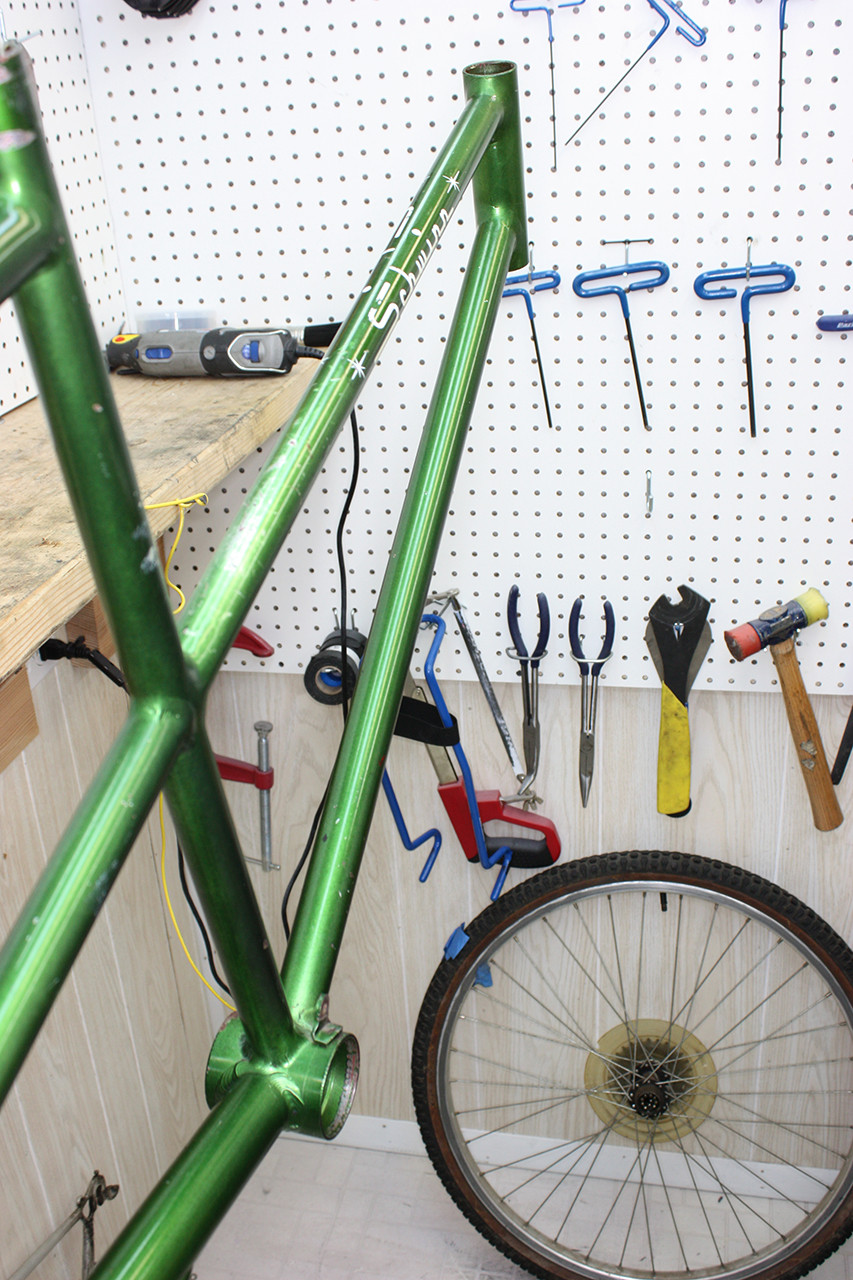 Polished frame of the Schwinn Twinn Tandem, demonstrating the significant improvement after cleaning and polishing.