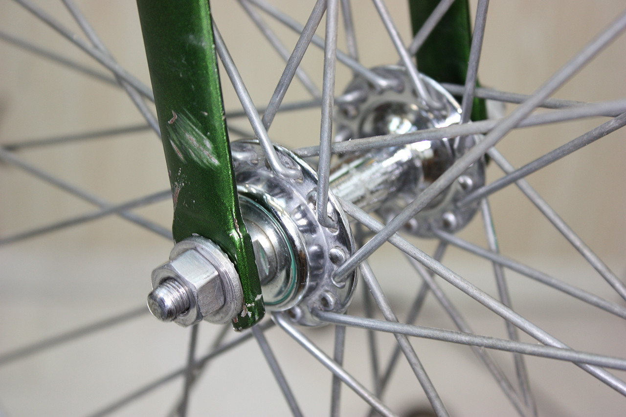 Front wheel hub of the Schwinn Twinn Tandem polished and installed, ready for rim and tire.