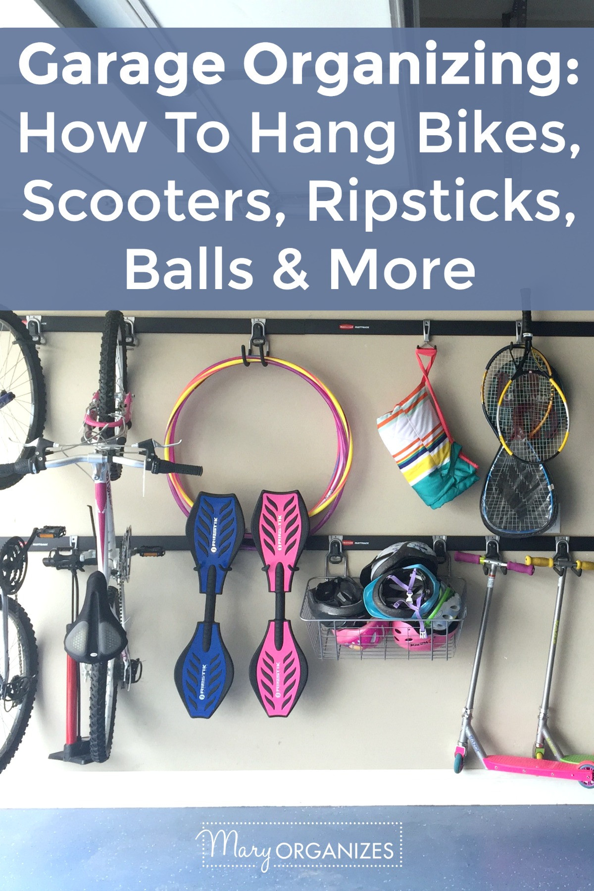 Garage with bikes, scooters, ripsticks, balls and more hung on the wall using a track system.