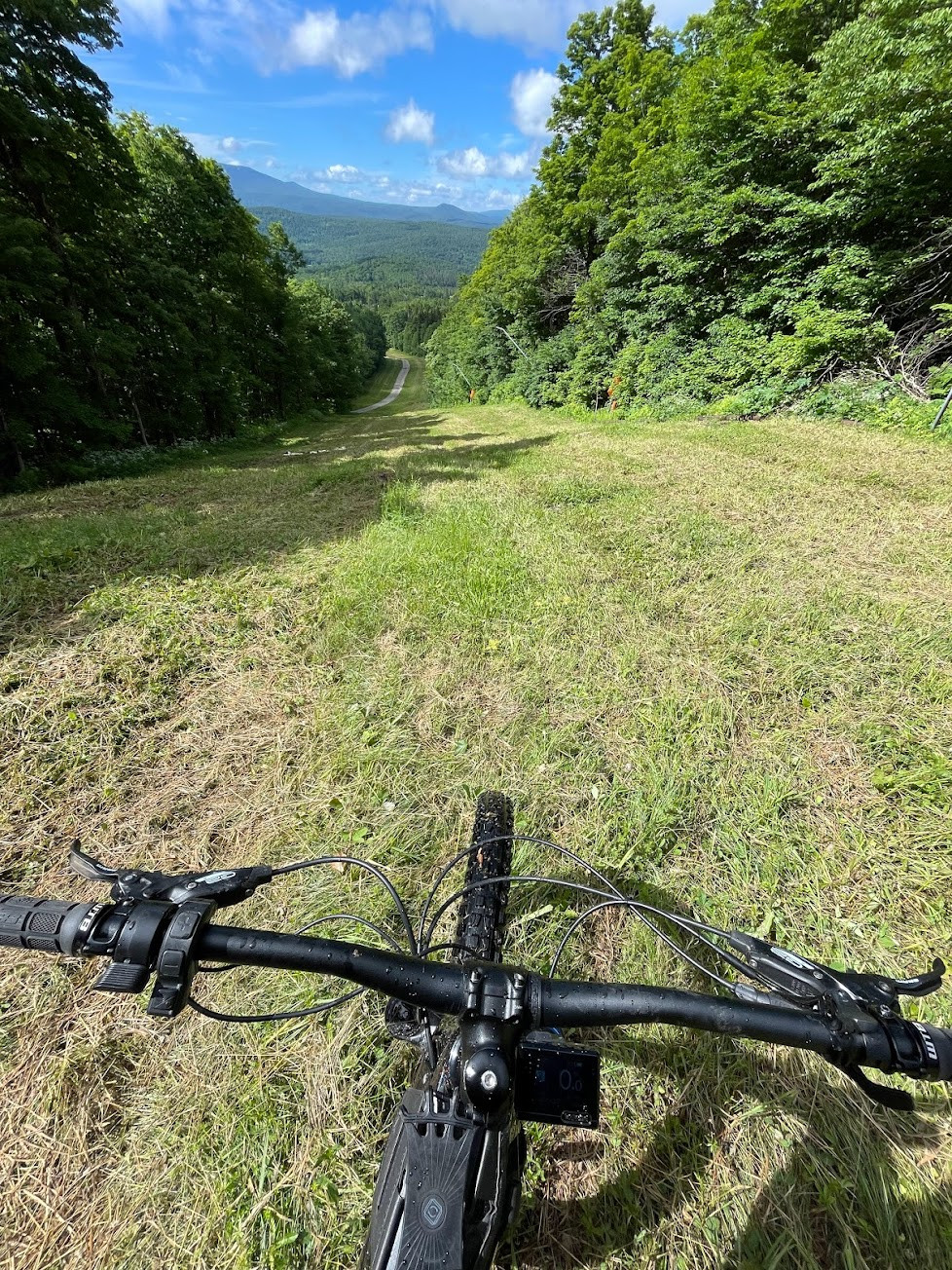 Multiple images showcasing the Luna X2 in various outdoor trail environments.