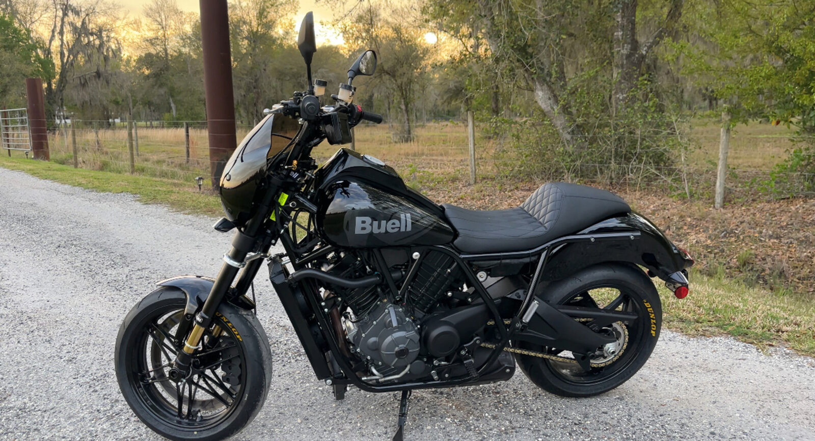 Front three-quarter view of the Buell Super Cruiser emphasizing its sporty front forks, headlight design, and overall muscular appearance