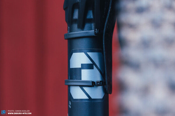 Scratches on mountain bike fork lowers from strap-on fender