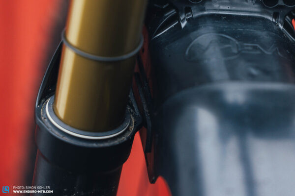 Clean mountain bike fork seals after fender use, showing effective fork protection