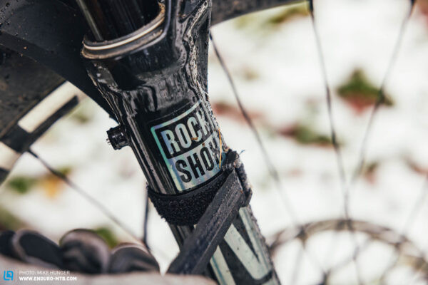 Bike fender secured with Velcro straps to a mountain bike fork