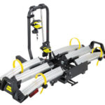 Close-up of the Kilimanjaro hitch mounted e-bike carrier, highlighting the hitch post and platform where cracks may form, as part of a safety recall announcement.