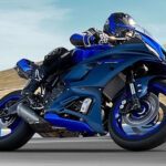 Yamaha R7 leans into a corner on a racetrack, showcasing its agility and sporty design
