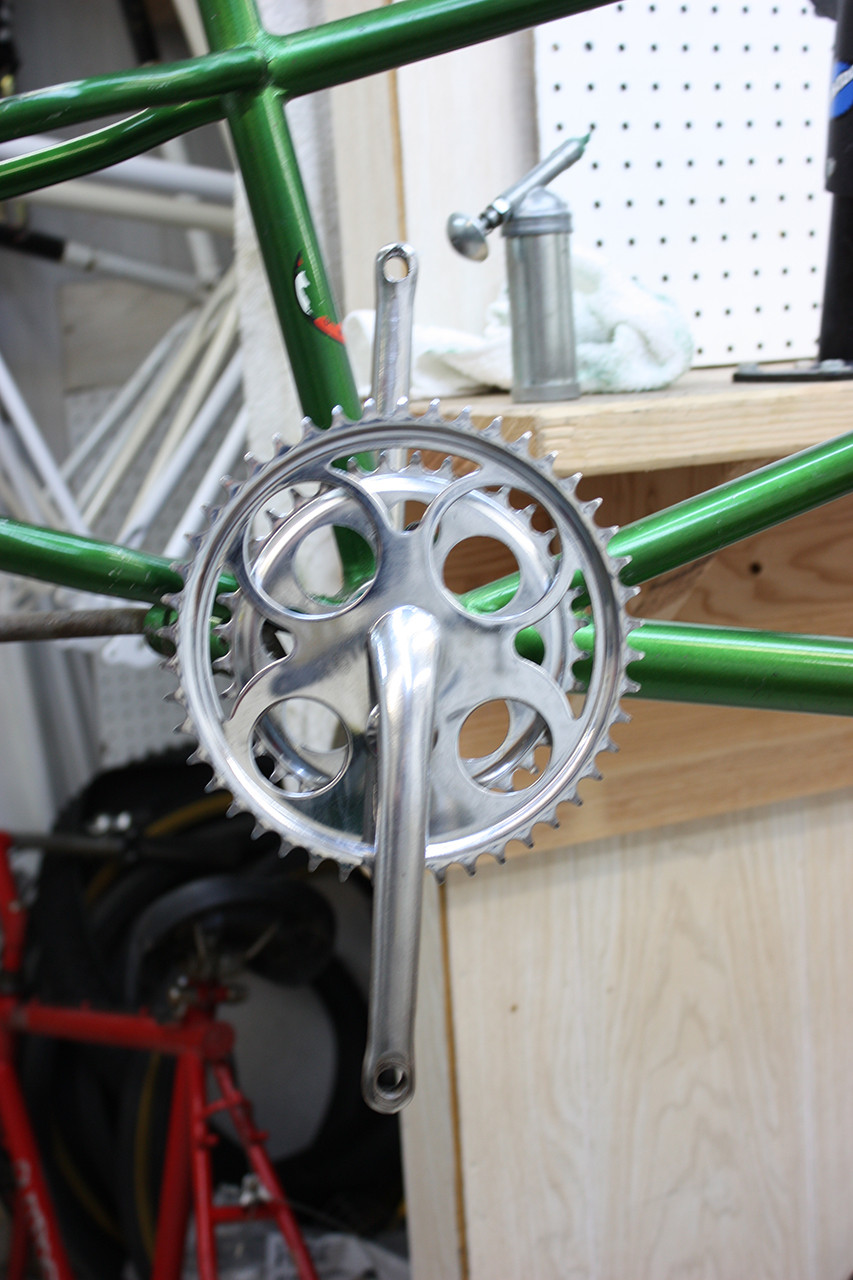 Rear crank installed on the vintage Schwinn tandem, completing the bottom bracket assembly.