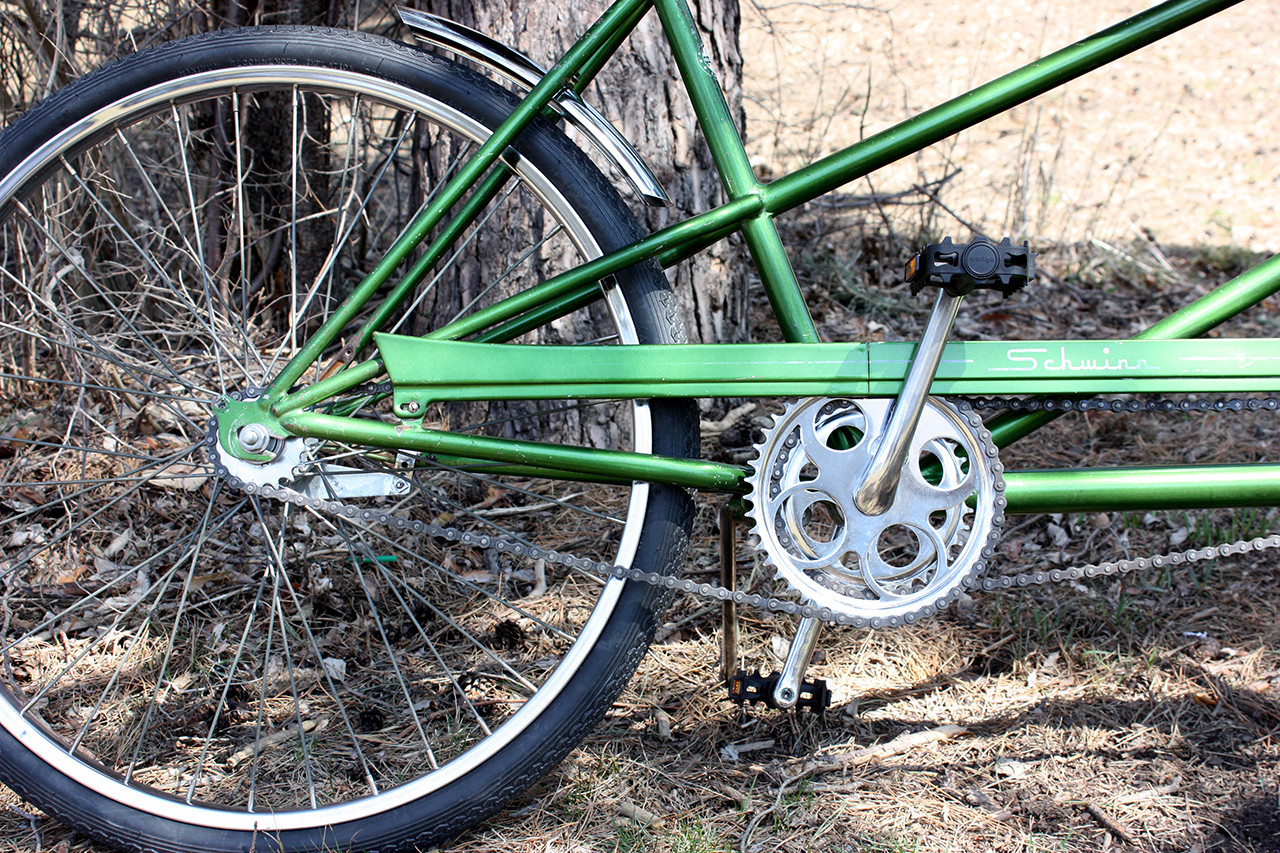 Rear drivetrain view of the finished Schwinn Twinn Tandem, showcasing the polished components and new tires.