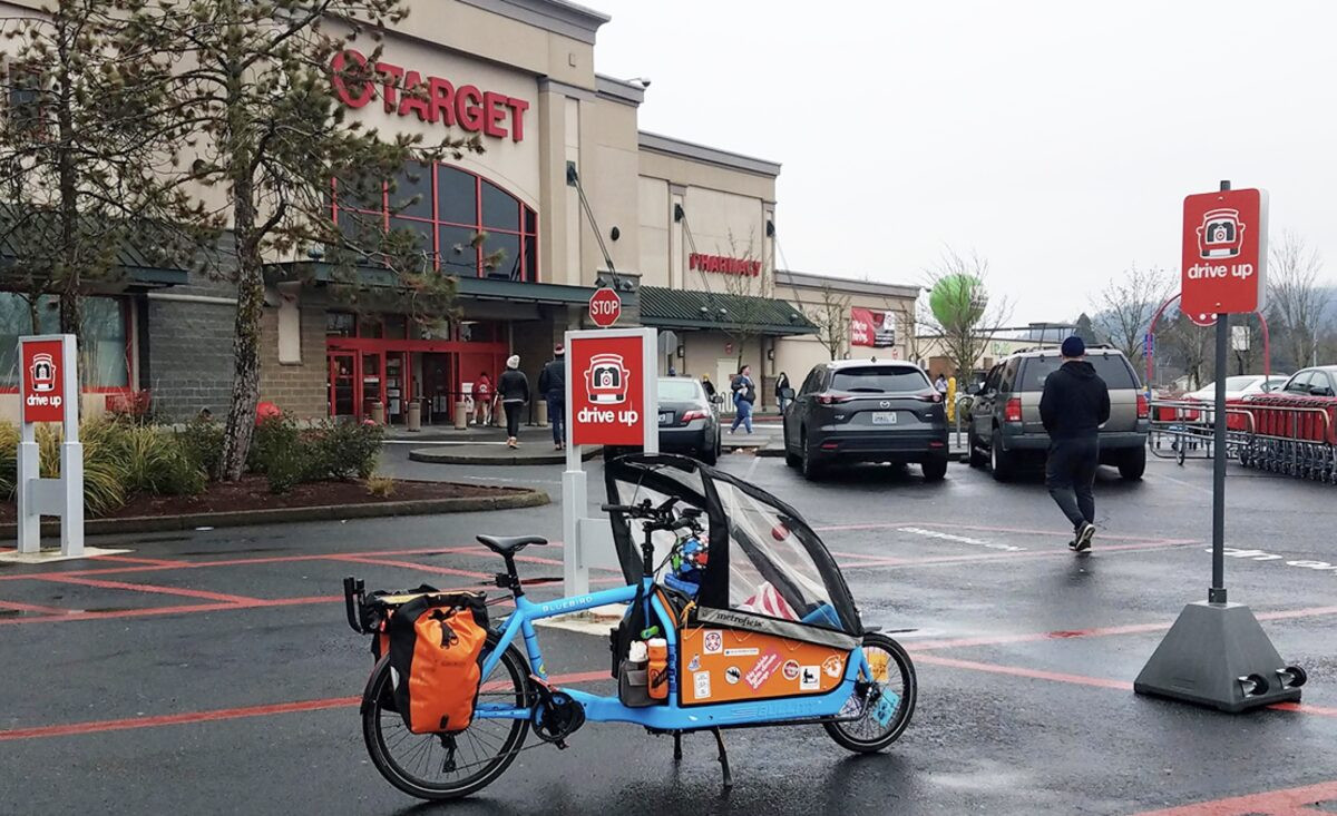 Target employee delivering order to a cyclist