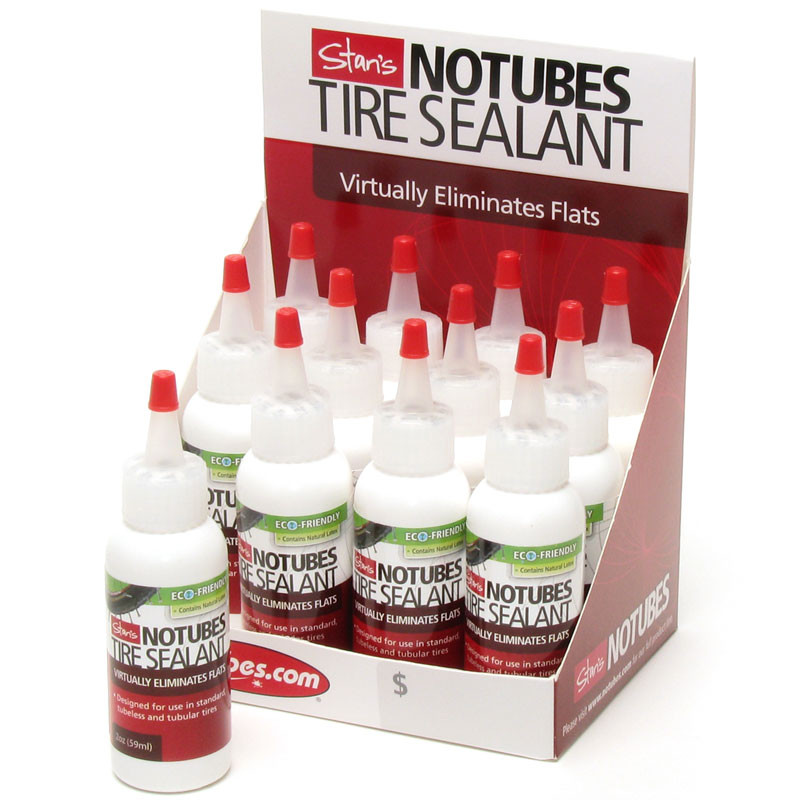 bottle of stans notubes tire sealant with white liquid