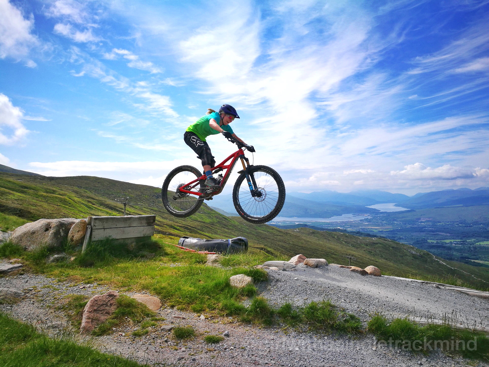 Rider descending the Fort William World Cup track on Ibis Mojo 3