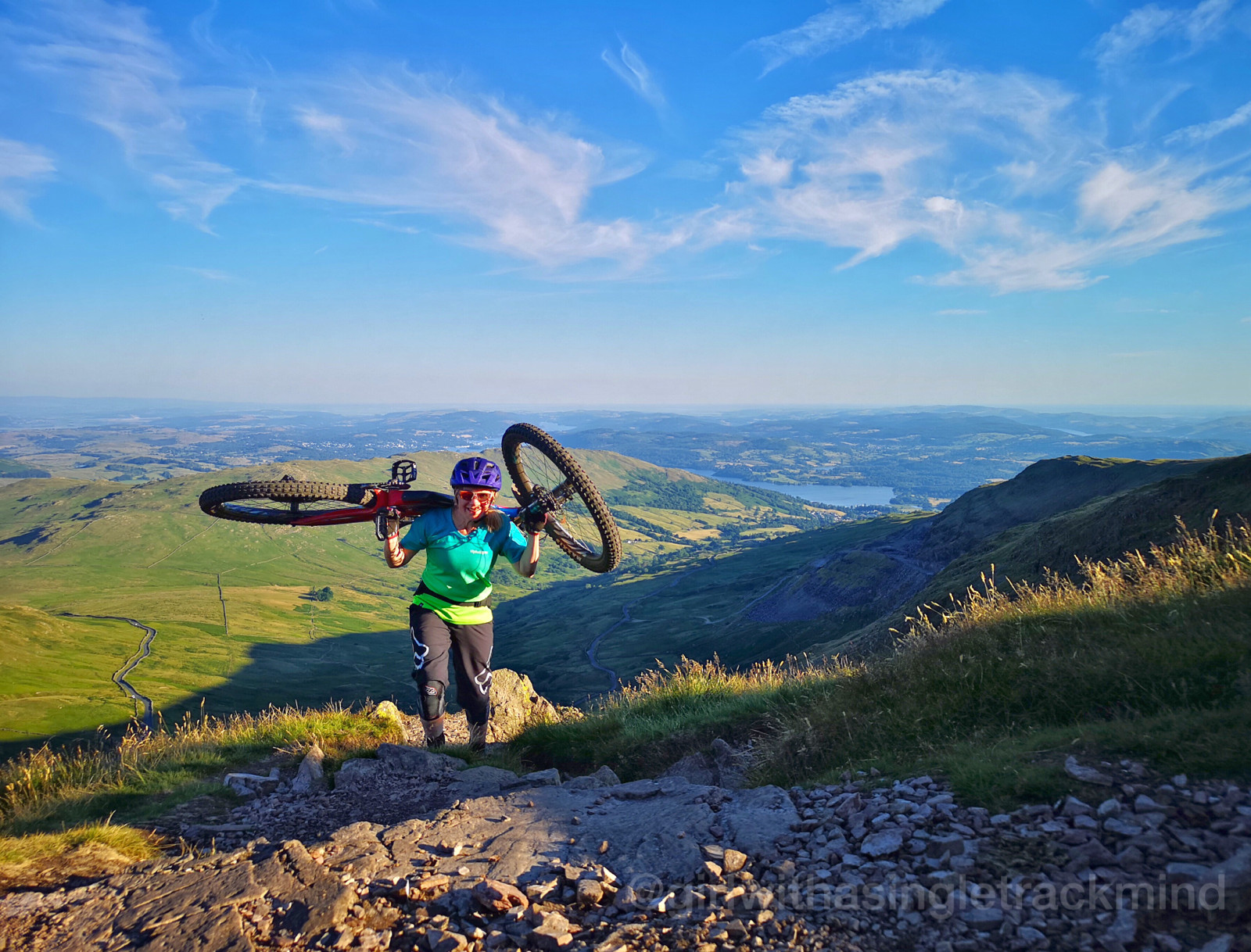 Rider climbing a steep section on the Ibis Mojo 3