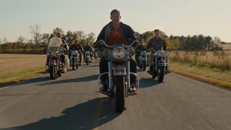 Tom Hardy embodying the biker gang leader in 'The Bikeriders' movie.
