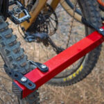 Close-up of multiple bikes loaded on the Velocirax 5X bike rack, showcasing its capacity and versatility for different bike types.