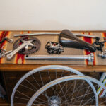 Close-up of vintage bicycle components, possibly Suntour XC Pro, with a focus on polished metal and classic design