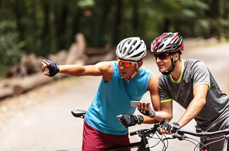 Cyclists navigating a scenic route, developing their navigational skills