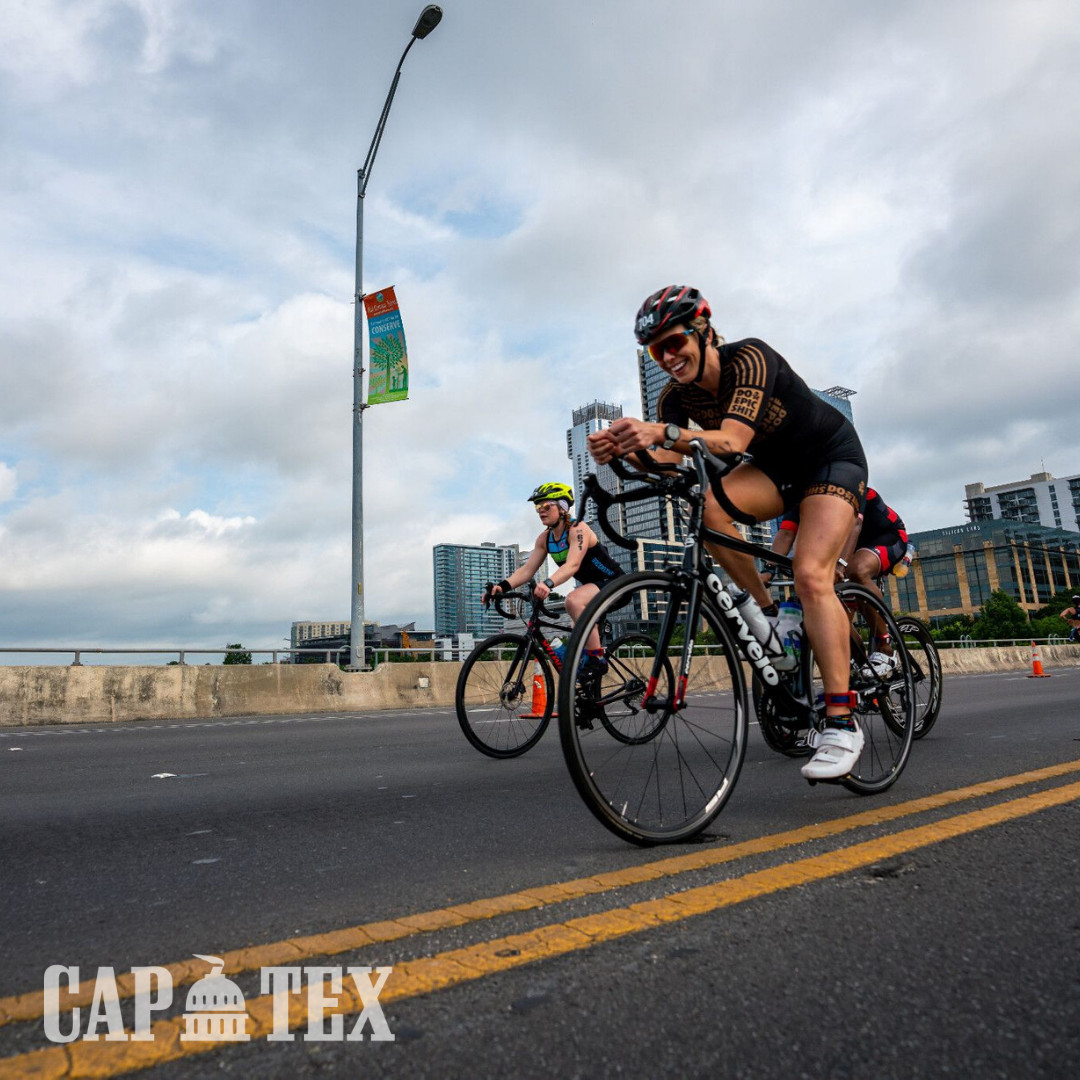 Cyclists wearing padded cycling shorts, jerseys, and helmets.