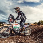 Rider demonstrating proper foot placement on dirt bike footpegs for control and stability