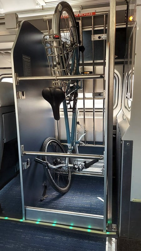 Cyclist Securing Bike on Amtrak