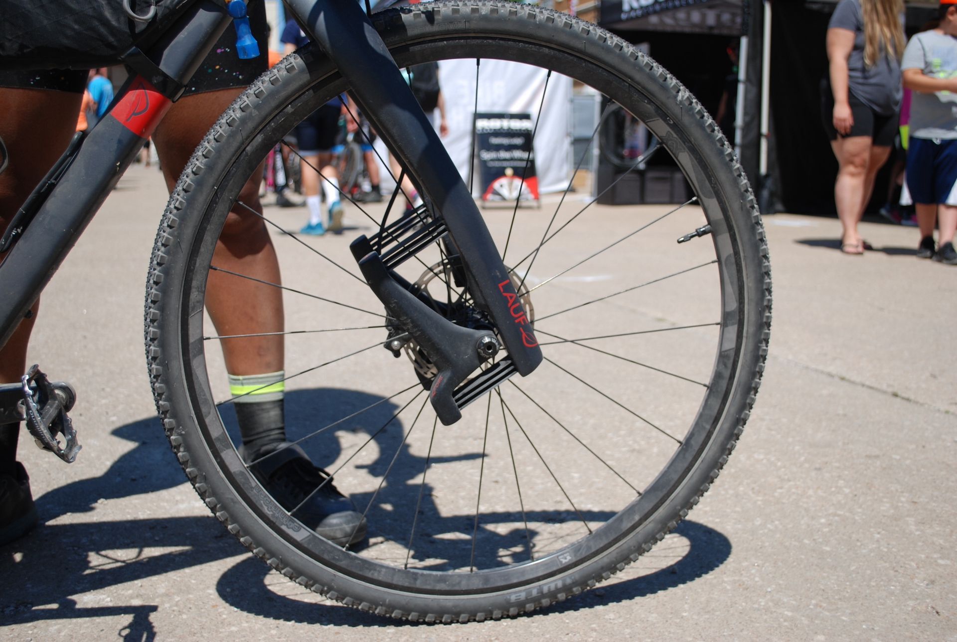 Lauf's Grit SL fork on a gravel bike illustrates the innovative use of carbon springs to provide suspension without the complexity of traditional moving parts