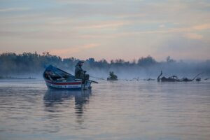 Fisherman at sunrise on the American River