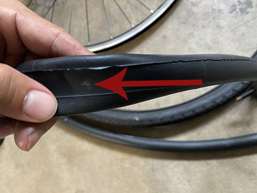 Locating the hole in the inner tube