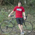 Photo of Steven with his bike