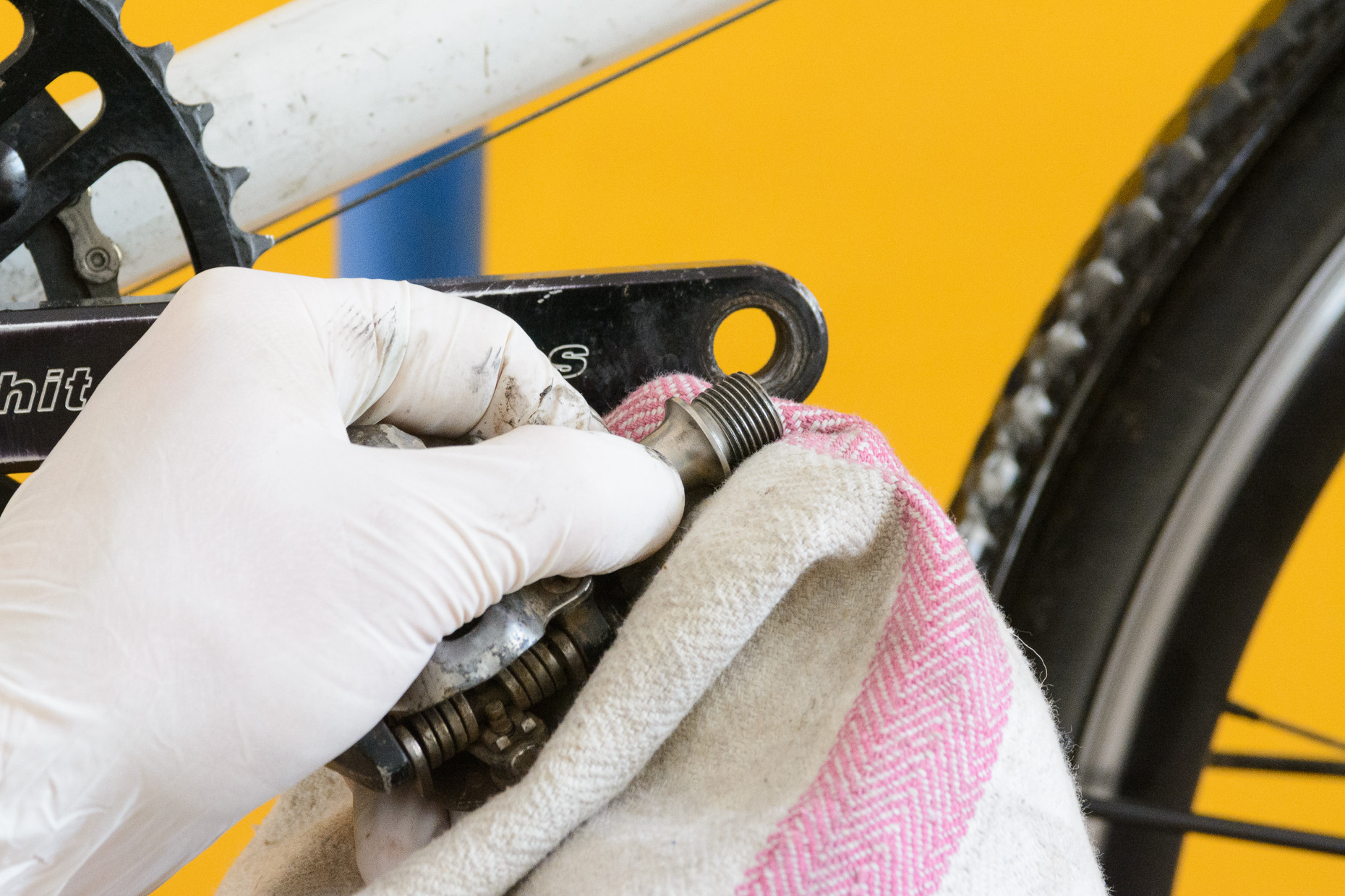 Cleaning the threads of a bike pedal before installation