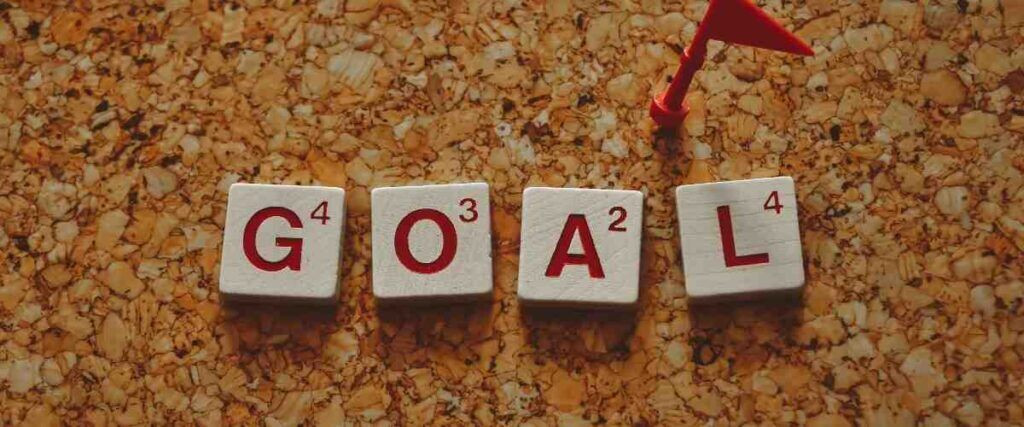 Goal written out with scrabble game pieces. 