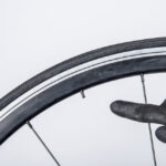 Securing a motorcycle for wheel removal