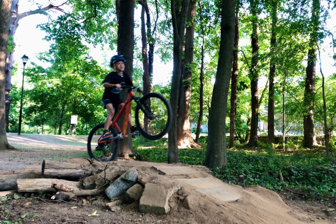 Mountain bike rider stretching