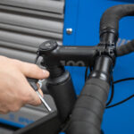 Loosening stem bolts for handlebar adjustment