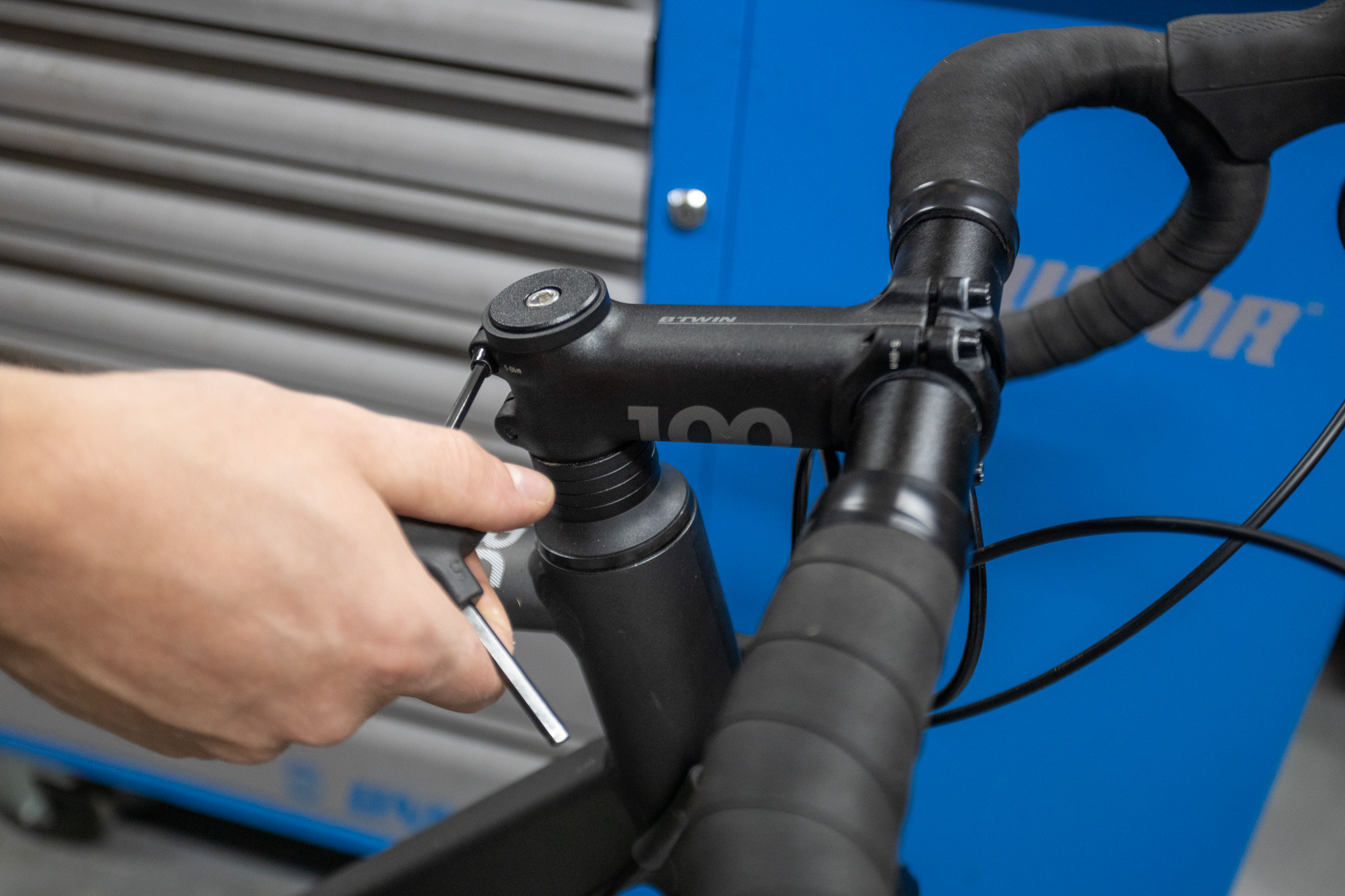 Loosening stem bolts for handlebar adjustment